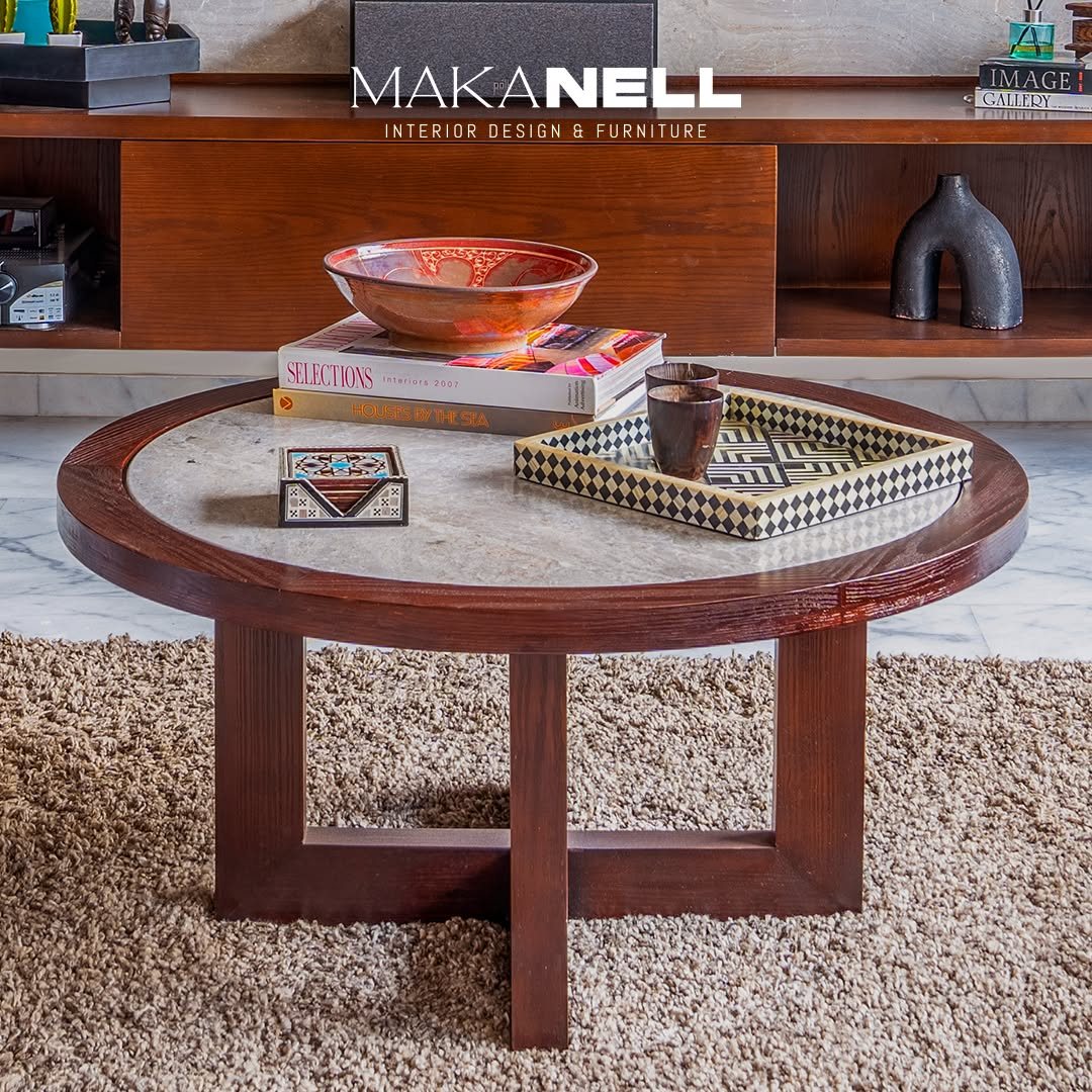 Round marble-top coffee table with a timber base