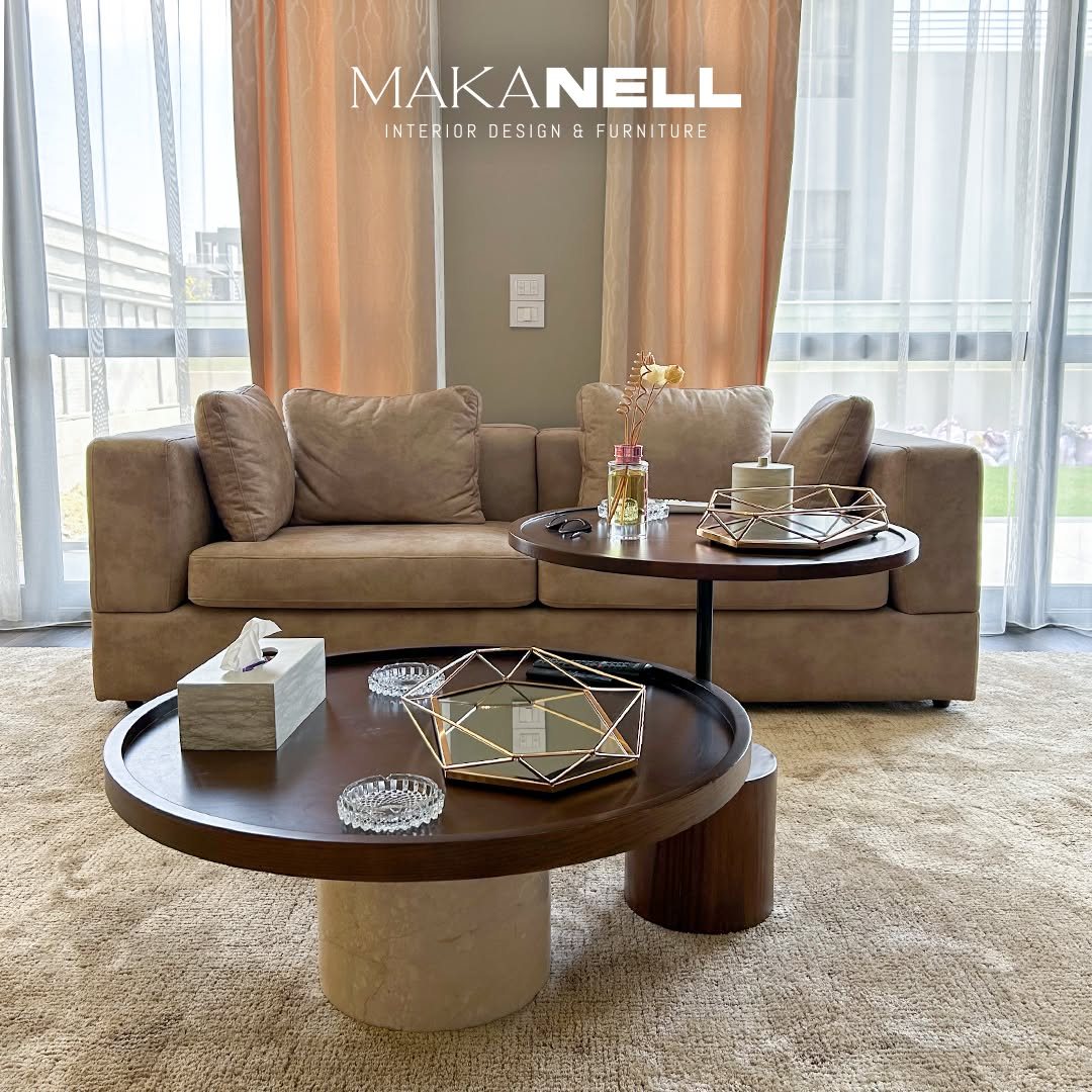 Beige sofa and round coffee tables in a photographed MAKANELL living interior