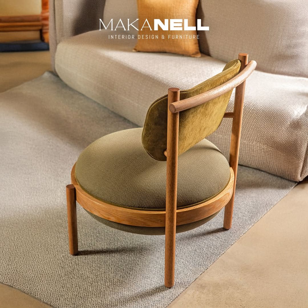 Round walnut chair with olive upholstery